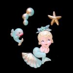 Missy Mermaid on Shell with Tiny Fish